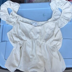 Peasant top by AND NOW THIS Cream Ruffled Smocked Blouse